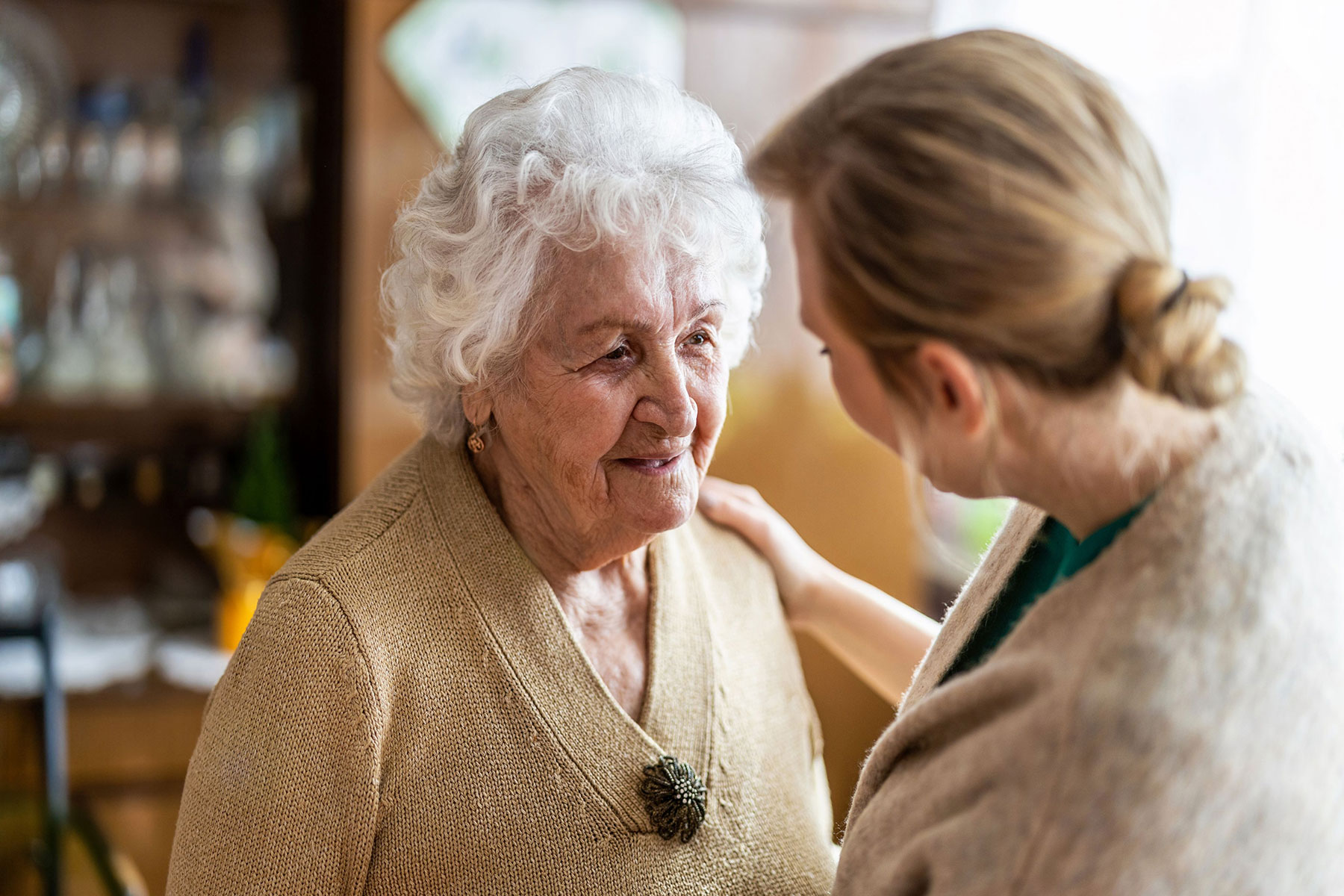 Staged Memory Care, talking with resident